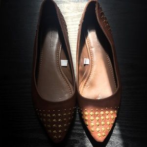 Brown pointed flats